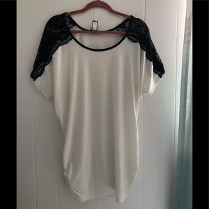 White top with black lace detail